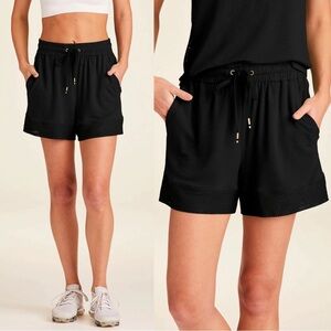 ALALA • Heron Short black jersey knit high waisted pull on soft flowy